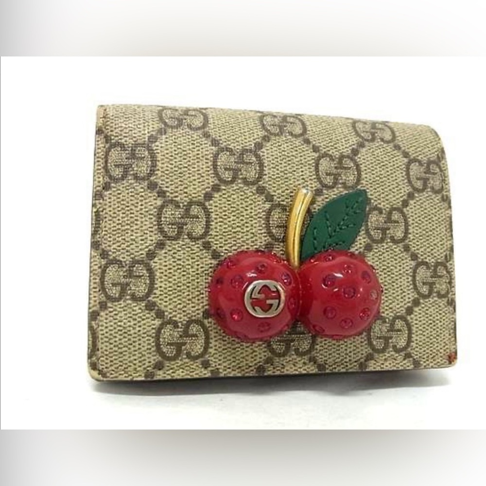 GUCCI GG Supreme PVC x leather cherry bi-fold wallet brown